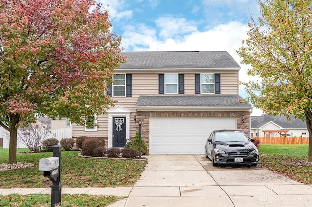 view of front of home with a garage