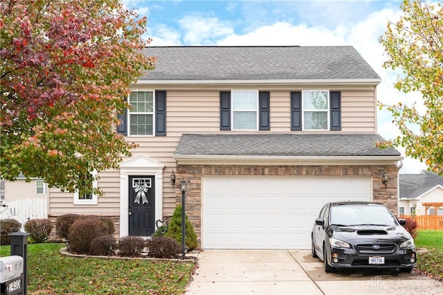 view of front of home with a garage