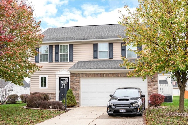 view of front of home with a garage