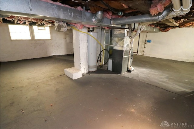 basement with heating unit and gas water heater