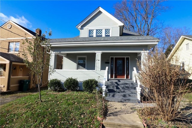 view of front of home featuring a front lawn