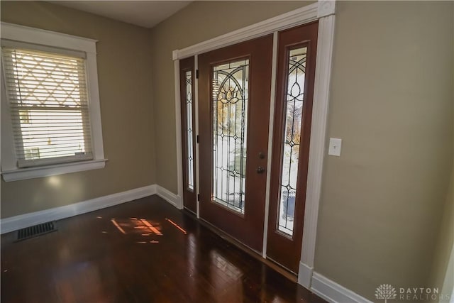 entryway featuring dark wood-type flooring