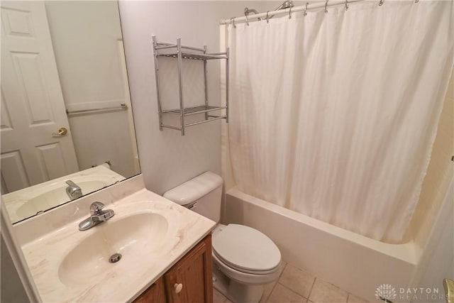 bathroom with shower / bath combo, vanity, toilet, and tile patterned floors