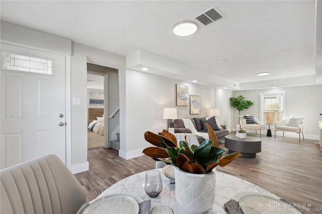 living room with light hardwood / wood-style floors