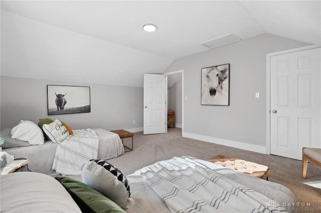 carpeted living room with vaulted ceiling