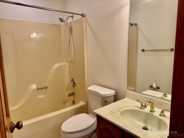 full bathroom featuring vanity, toilet, and shower / bath combination