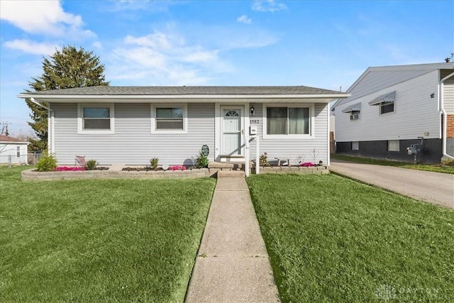 view of front of home with a front yard