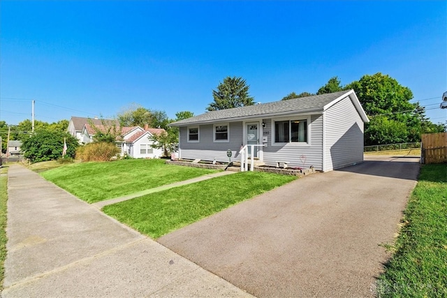 view of front of home featuring a front yard