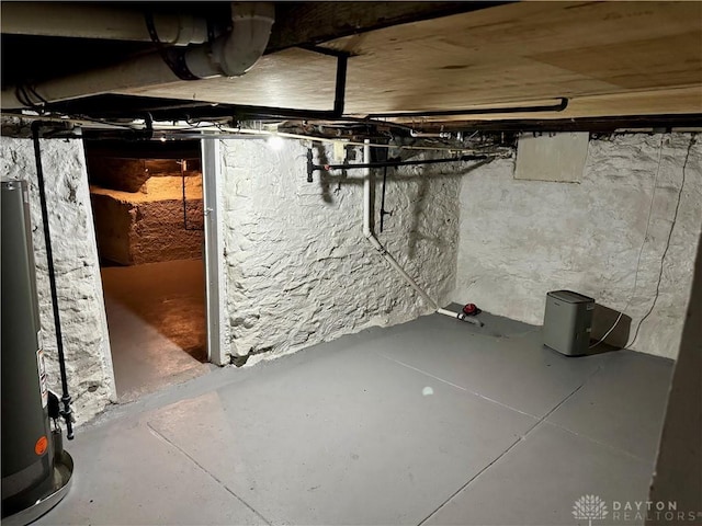 basement featuring gas water heater