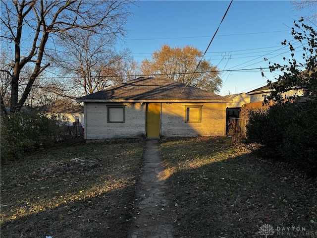 view of property exterior featuring a yard