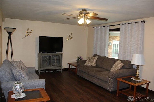 living room featuring ceiling fan and wood finished floors