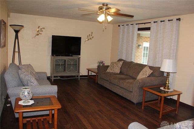 living area featuring ceiling fan and wood finished floors