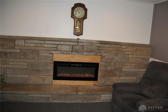 room details featuring a stone fireplace