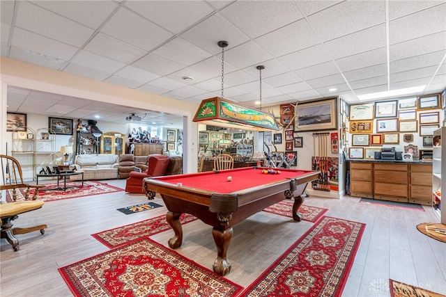 playroom featuring a drop ceiling, light hardwood / wood-style floors, and billiards