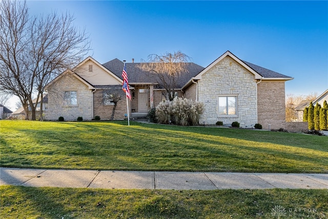 view of front of home with a front yard