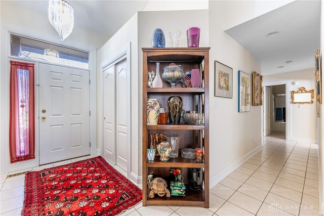 view of tiled foyer entrance