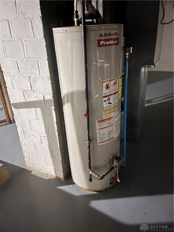 utility room with water heater