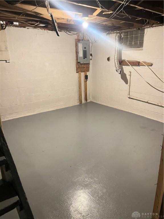 basement featuring electric panel