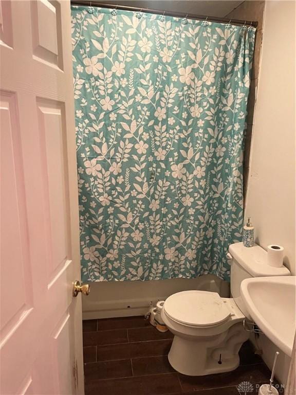 bathroom featuring toilet