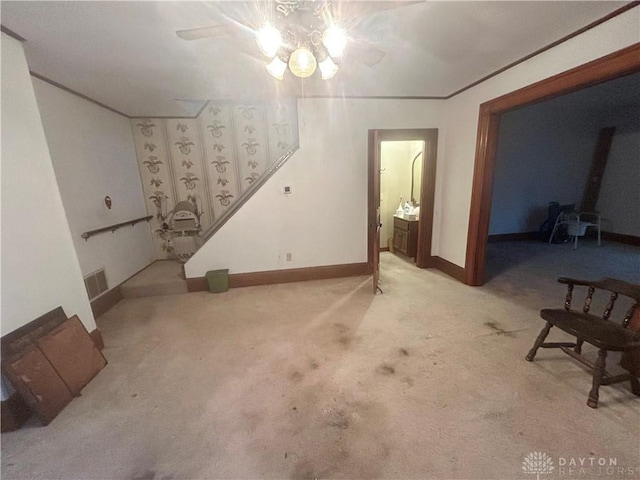 basement featuring light colored carpet