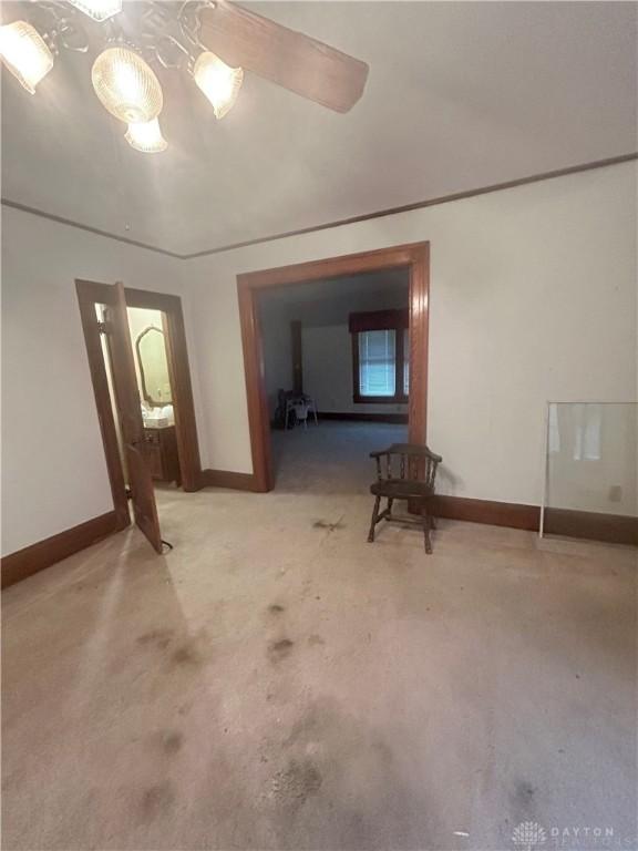 spare room with light colored carpet