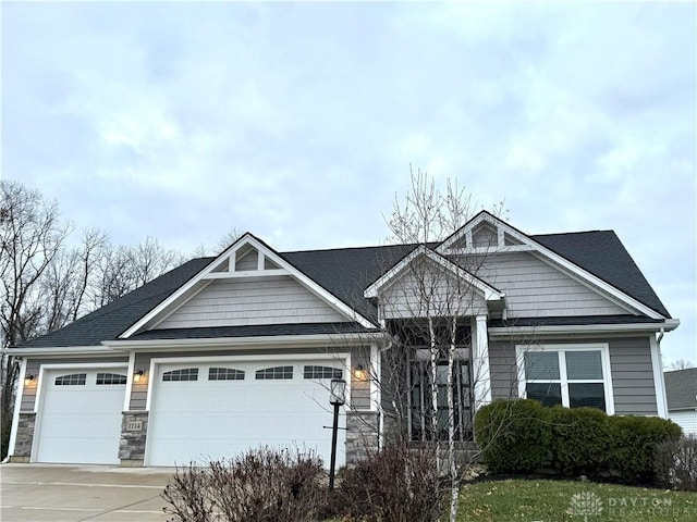 craftsman-style home featuring a garage