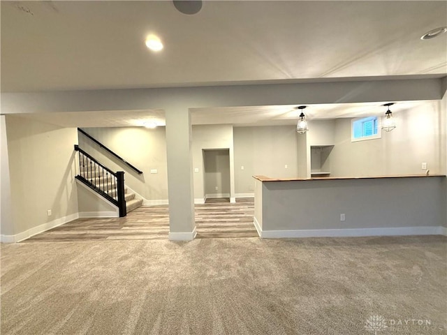 basement featuring carpet floors