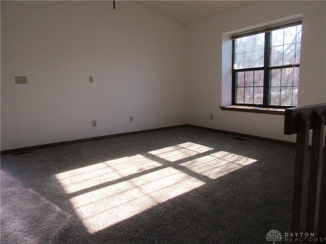 spare room featuring carpet flooring