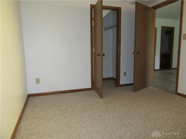 unfurnished bedroom with carpet