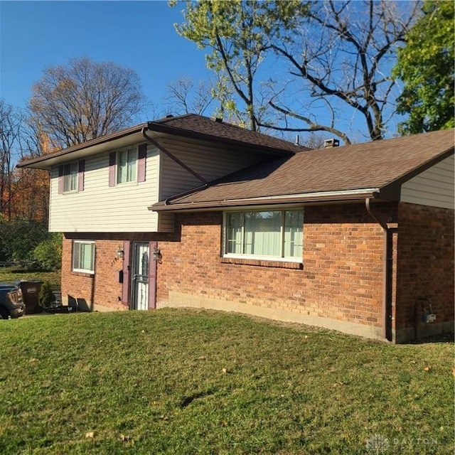 view of home's exterior featuring a lawn