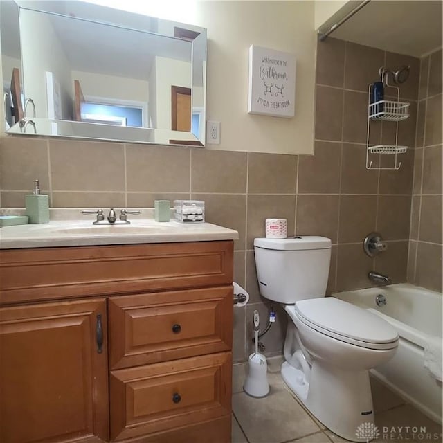 full bathroom with tasteful backsplash, tile walls, vanity, and tiled shower / bath combo