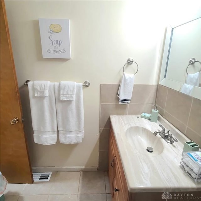 bathroom featuring vanity and tile patterned floors