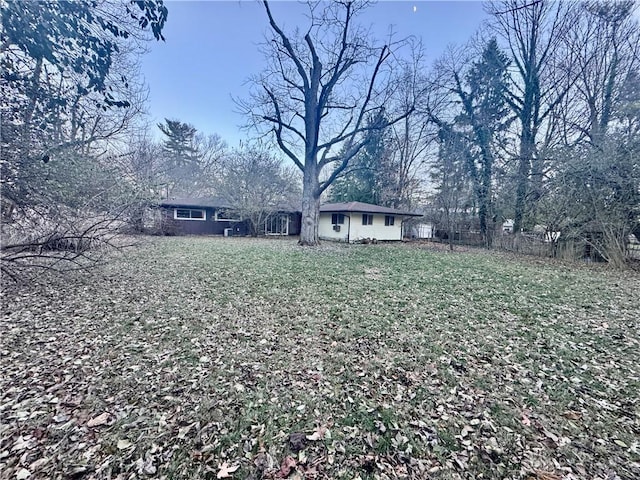 view of yard with fence