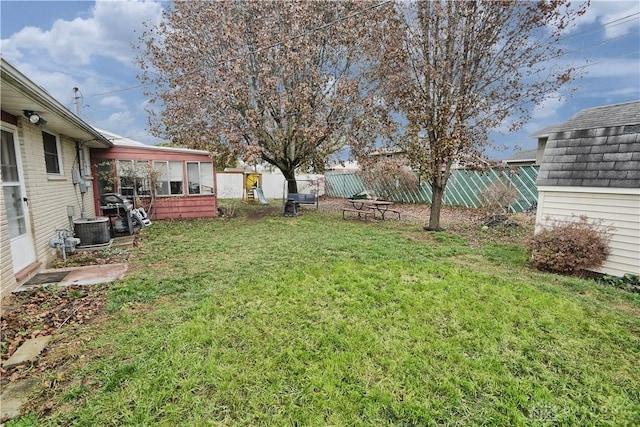 view of yard with central air condition unit