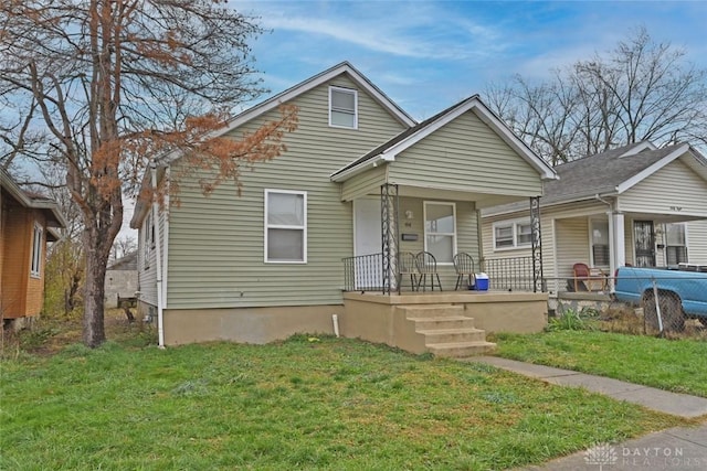 bungalow with a front lawn