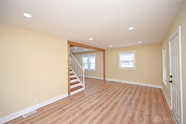 basement featuring light hardwood / wood-style flooring