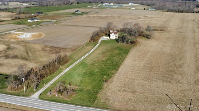 birds eye view of property featuring a rural view