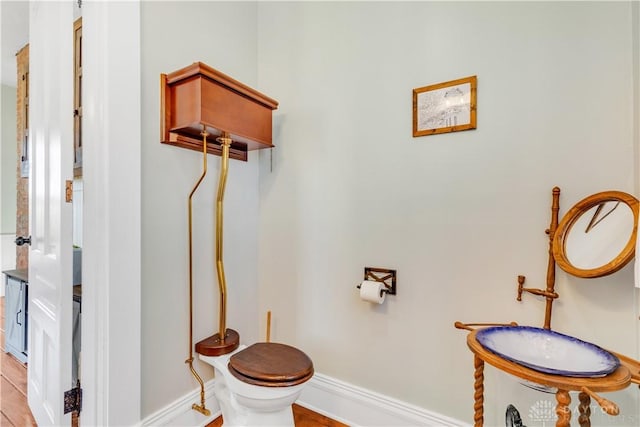 bathroom with tile patterned flooring and toilet