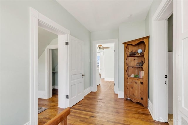 corridor featuring light hardwood / wood-style flooring