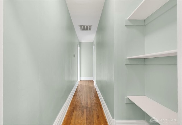 hall featuring hardwood / wood-style flooring