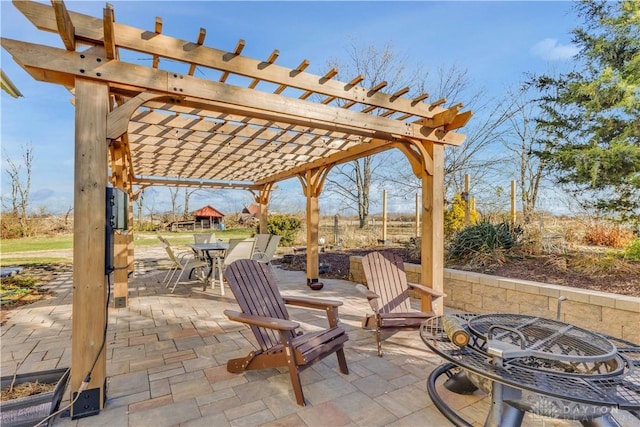 view of patio featuring a pergola