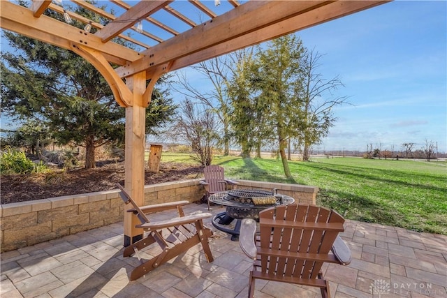 view of patio featuring a pergola and an outdoor fire pit