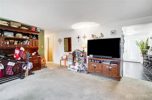 living room featuring light carpet