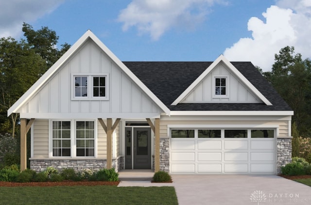 view of front of property with a garage and a front yard