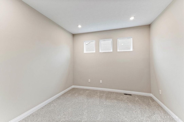 4517 Renaissance Blvd Unit 263, Franklin, OH 45005 - empty room featuring carpet floors, baseboards, and recessed lighting