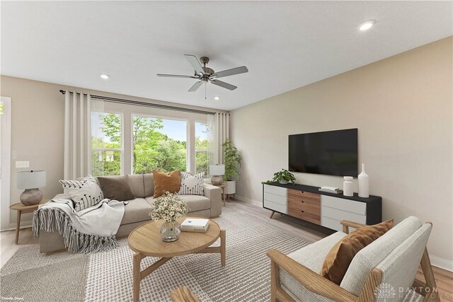 4517 Renaissance Blvd Unit 263, Franklin, OH 45005 - living room featuring a ceiling fan, baseboards, recessed lighting, and light wood-style flooring