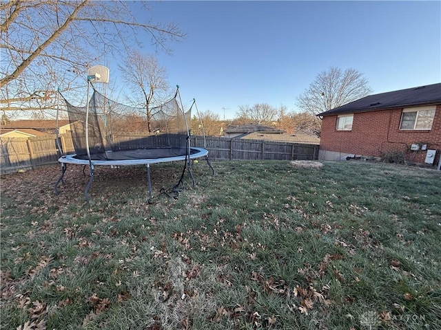 view of yard featuring a trampoline