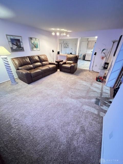 living room featuring carpet floors