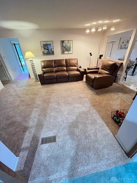 living room featuring carpet floors