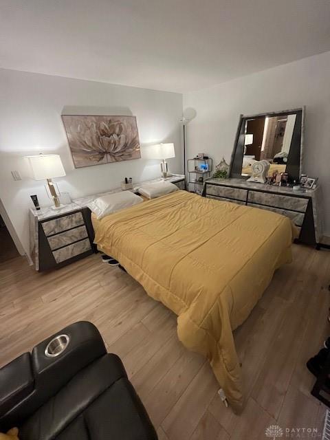 bedroom featuring hardwood / wood-style floors